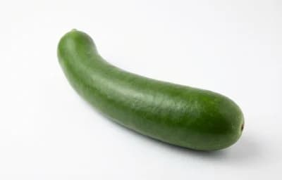 elongate dark green bottle gourd