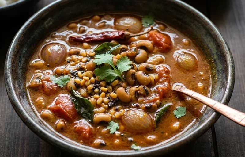 Karamani Kuzhambu, Steamed Basmati Rice, Seppankizhangu Fry and Tomato Rasam - Recipe 1