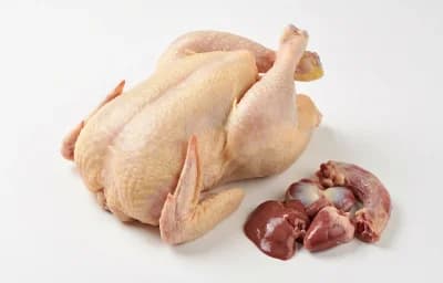 raw chicken with skin and giblets and neck
